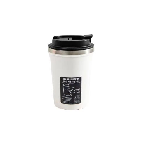 White travel mug with black lid and label on a white background